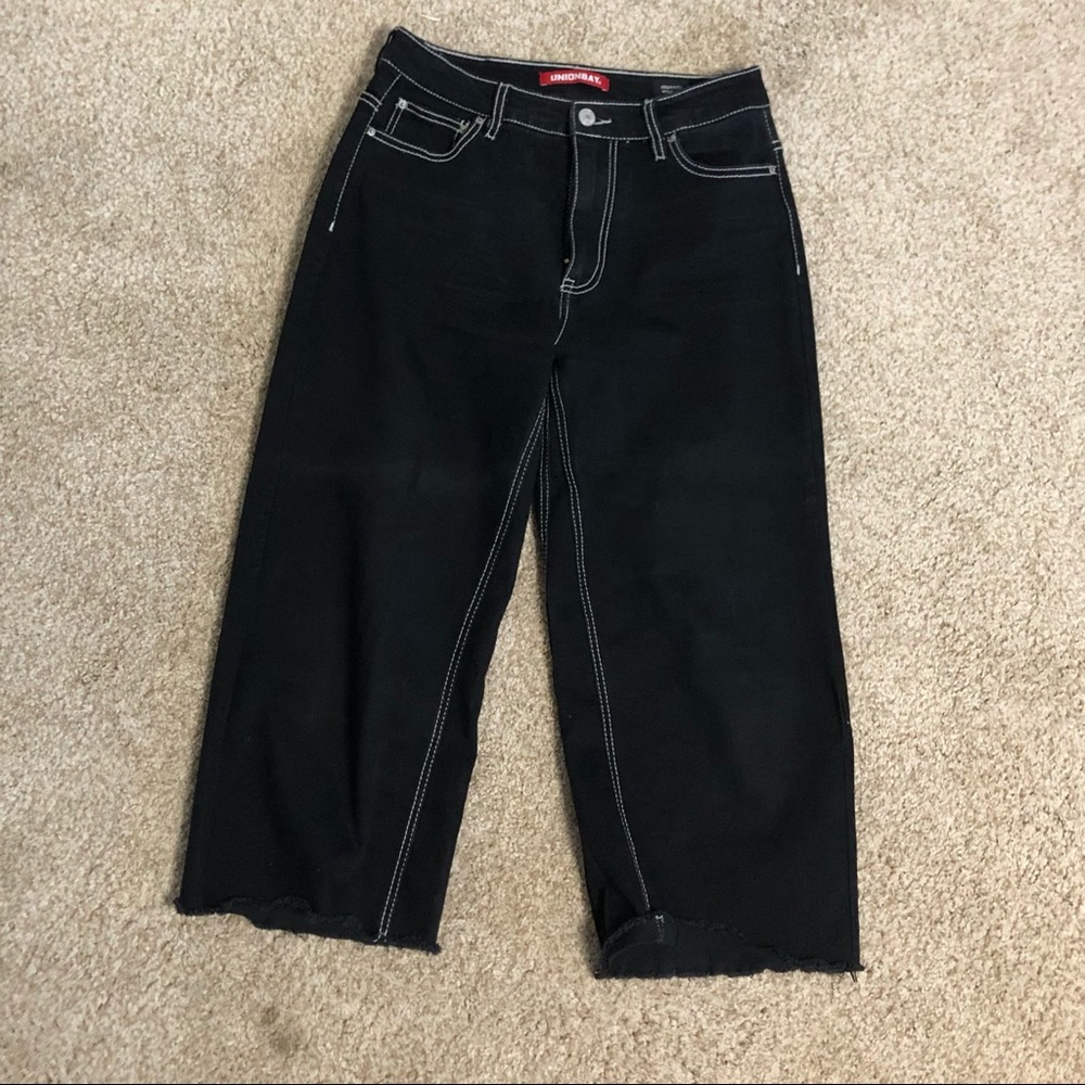 Black wide leg hi-rise jeans with white stitching